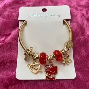Red and Gold Charm Bracelet